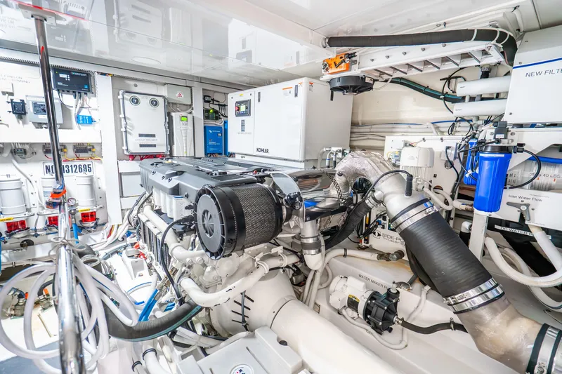 Slide: The Image of Engine room of 2021 Ocean Alexander 70E Motoryacht, showcasing advanced machinery and equipment. - 65