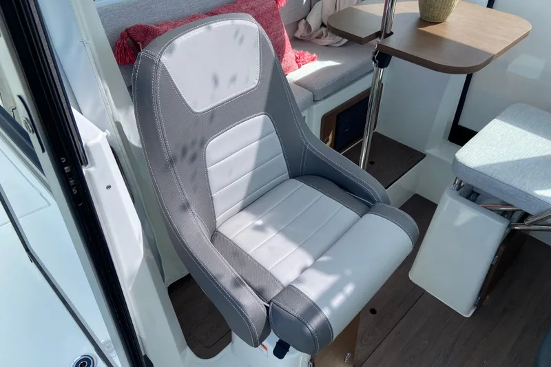 Slide: The Image of 2026 Jeanneau NC Sport 795 Series 2 interior with modern seating and table. - 27