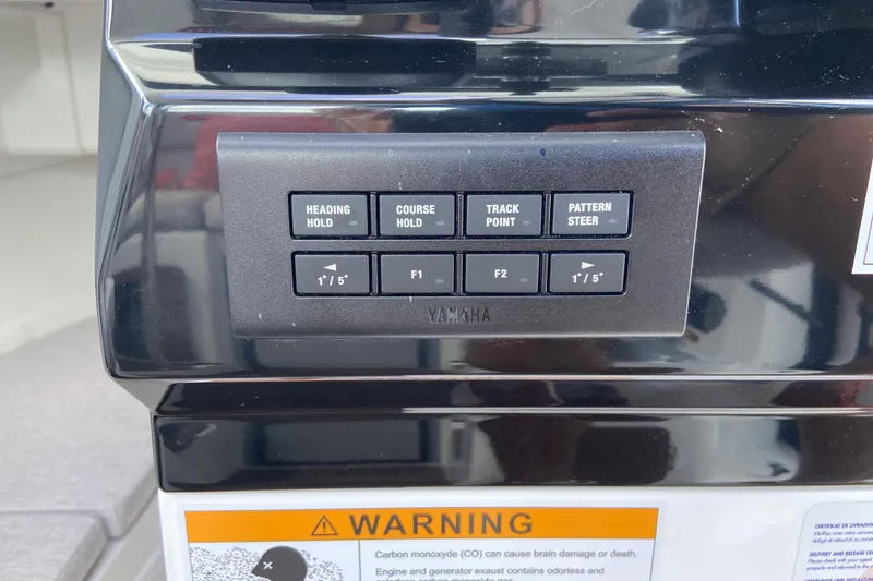 Slide: The Image of Control panel of 2026 Jeanneau NC Sport 795 Series 2 boat with Yamaha buttons. - 42