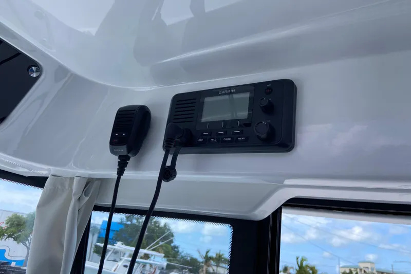 Slide: The Image of Interior view of 2026 Jeanneau NC Sport 795 Series 2 with Garmin marine radio system. - 43