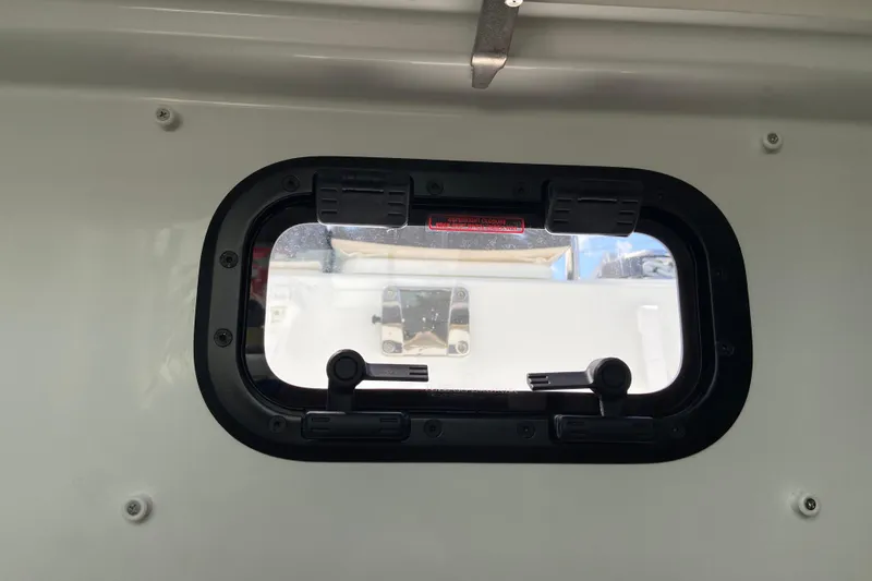Slide: The Image of Porthole view from Jeanneau NC Sport 795 Series 2, 2026 model boat interior. - 60
