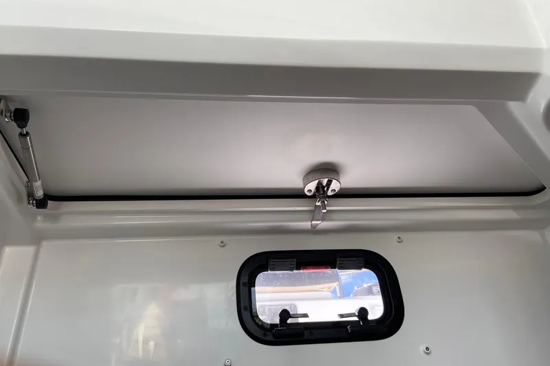 Slide: The Image of Interior view of 2026 Jeanneau NC Sport 795 Series 2 boat window and hatch. - 62