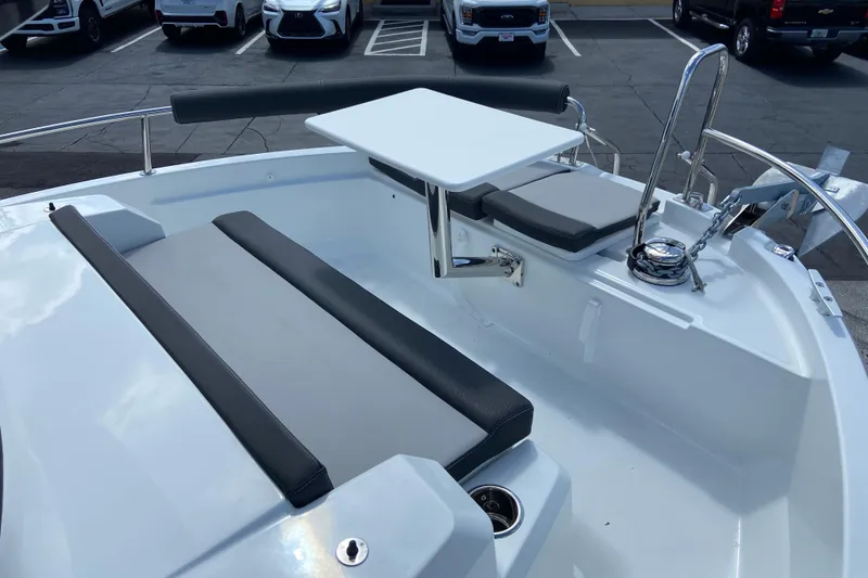 Slide: The Image of 2026 Jeanneau NC Sport 795 Series 2 boat interior with seating and table. - 67