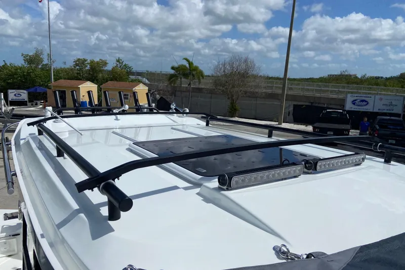 Slide: The Image of 2026 Jeanneau NC Sport 795 Series 2 boat roof with mounted lights and railings. - 72