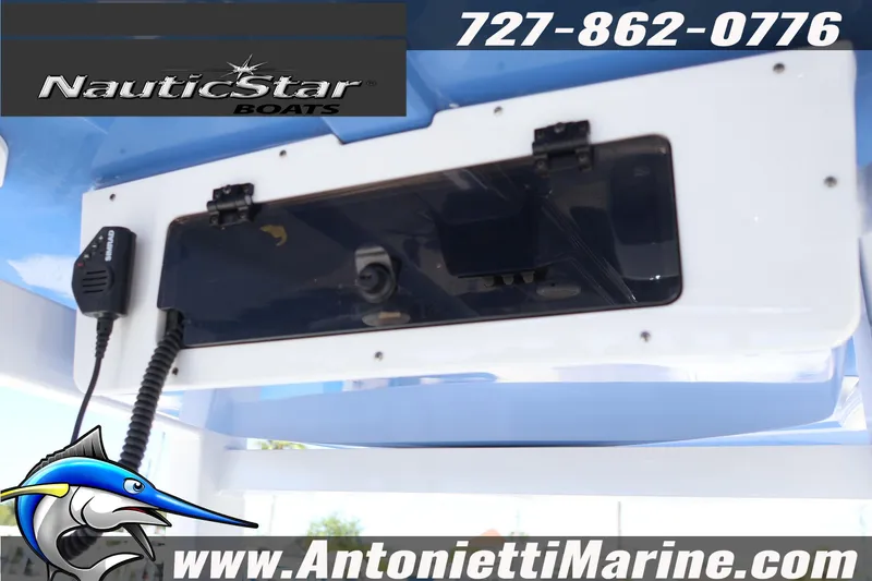 Slide: The Image of NauticStar 292 Legacy 2026 boat console with communication equipment, featuring Antonietti Marine branding. - 19