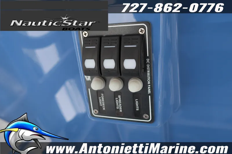 Slide: The Image of Control panel on 2026 NauticStar 292 Legacy boat, featuring switches and branding. - 20