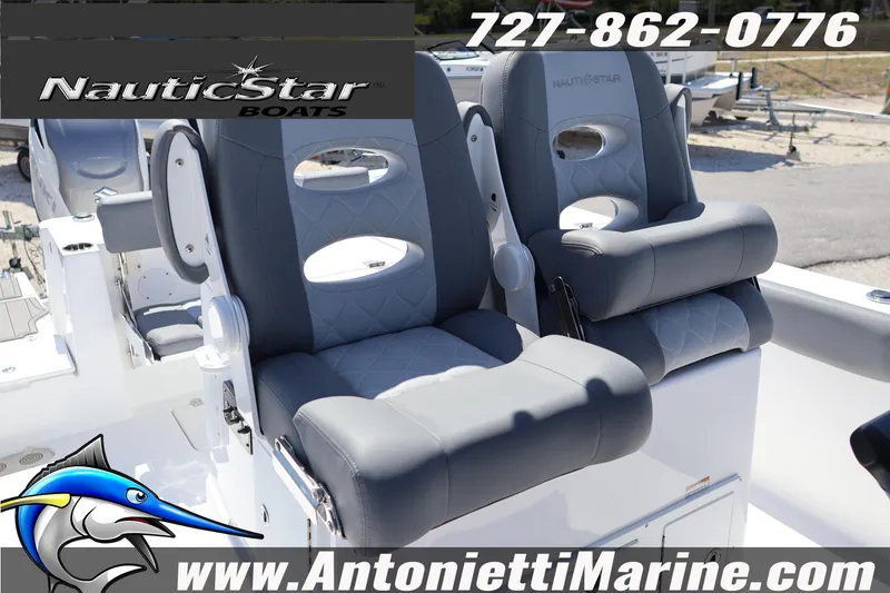 Slide: The Image of 2026 NauticStar 292 Legacy boat seats with logo and contact details. - 21