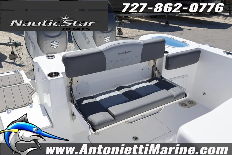 Slide: The Image of 2026 NauticStar 292 Legacy boat interior with seating and branding details. - 22