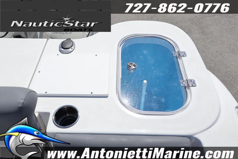 Slide: The Image of 2026 NauticStar 292 Legacy boat detail with contact info and website. - 23