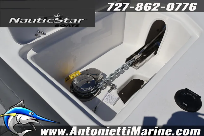 Slide: The Image of NauticStar 292 Legacy boat anchor compartment with chain and windlass, 2026 model. - 27