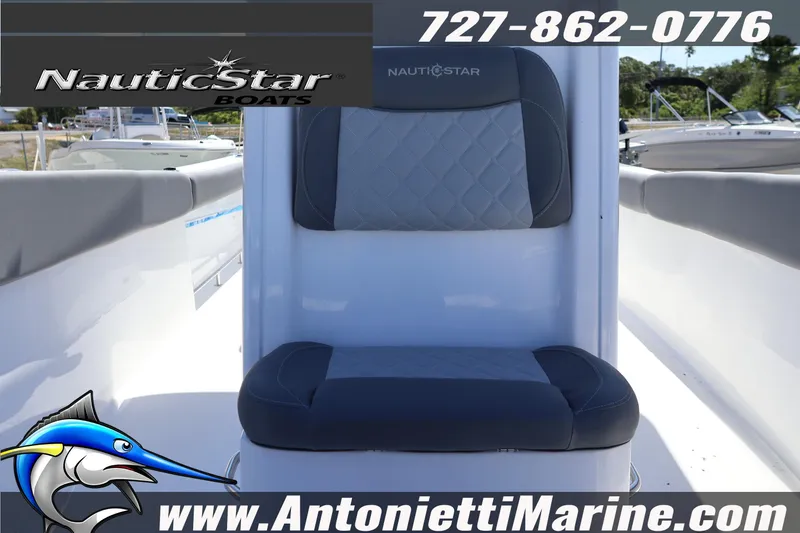Slide: The Image of 2026 NauticStar 292 Legacy boat seat with logo and contact details. - 28