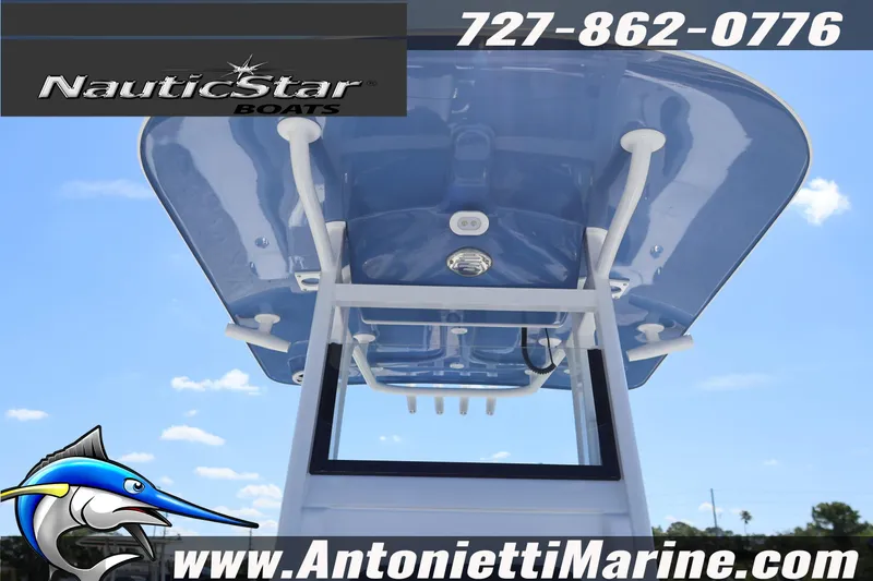 Slide: The Image of NauticStar 292 Legacy boat, 2026 model, viewed from below with contact details. - 29