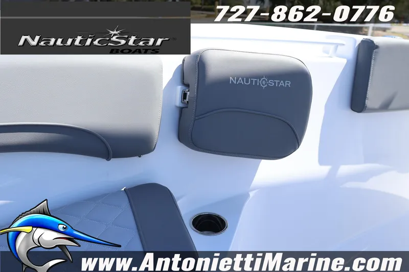 Slide: The Image of 2026 NauticStar 292 Legacy boat interior with logo and contact details for Antonietti Marine. - 30