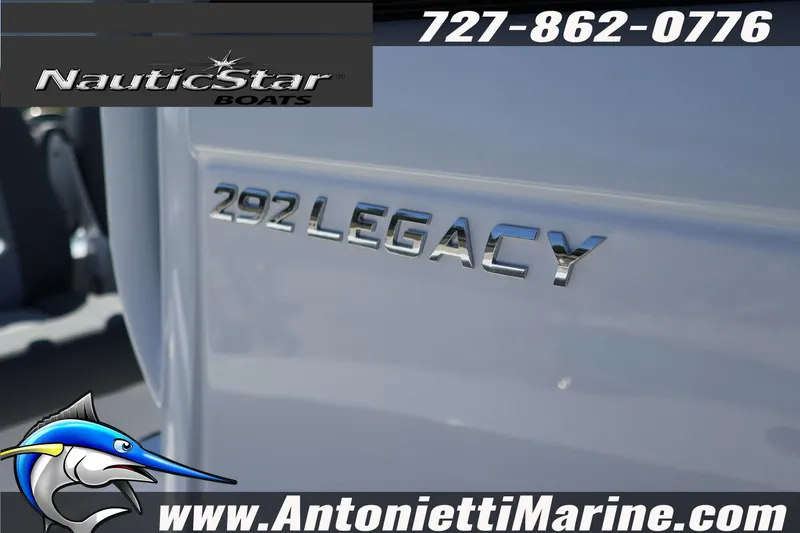 Slide: The Image of 2026 NauticStar 292 Legacy boat branding with contact details and website. - 32