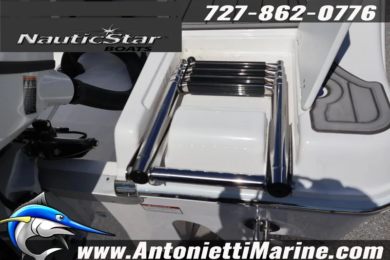 Slide: The Image of 2026 NauticStar 292 Legacy boat ladder and branding details. - 9