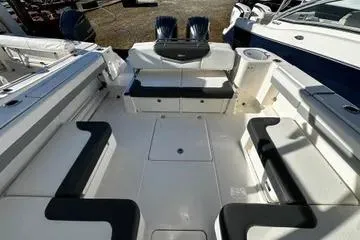 Slide: The Image of 2022 Robalo R317 Dual Console boat interior with spacious seating and modern design. - 3