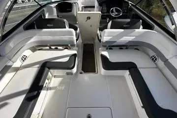 Slide: The Image of 2022 Robalo R317 Dual Console boat interior with spacious seating and modern design. - 5
