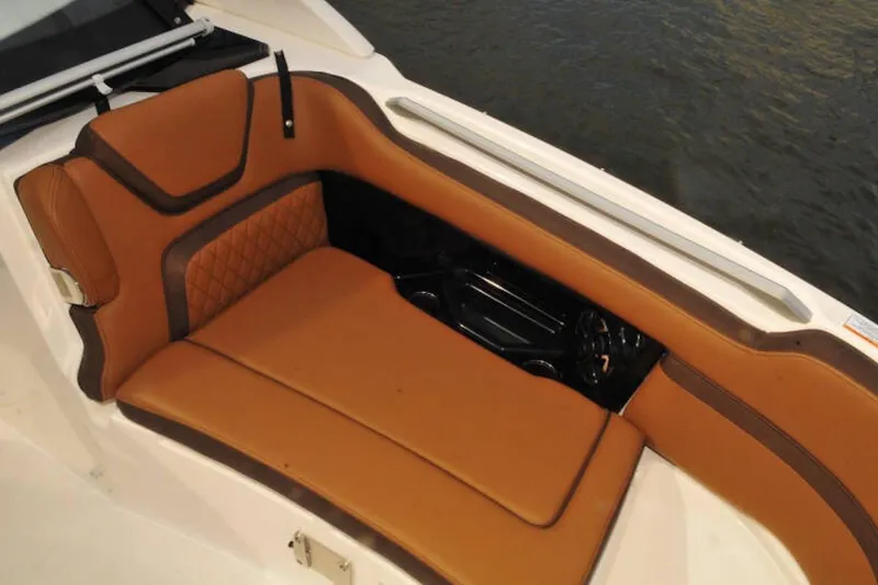 Slide: The Image of Luxurious seating on 2024 Yamaha Boats 275SDX, featuring elegant brown upholstery. - 13