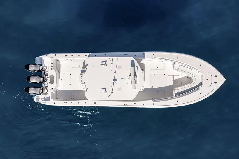 Slide: The Image of Overhead view of 2012 Yellowfin 39 Offshore boat on blue water. - 26