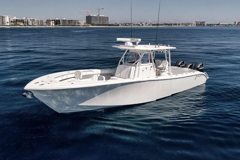 Slide: The Image of 2012 Yellowfin 39 Offshore boat on calm ocean waters. - 3