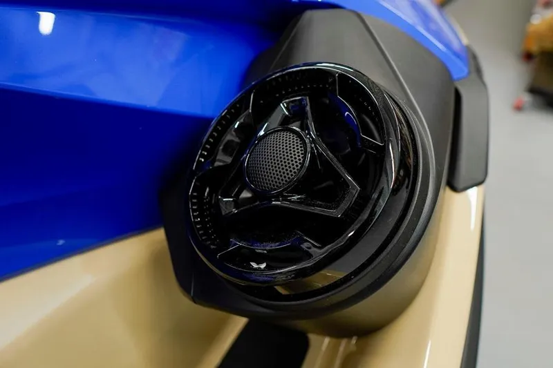 Slide: The Image of Close-up of 2026 Sea-Doo Wake Pro 230 speaker detail, featuring sleek black design. - 10