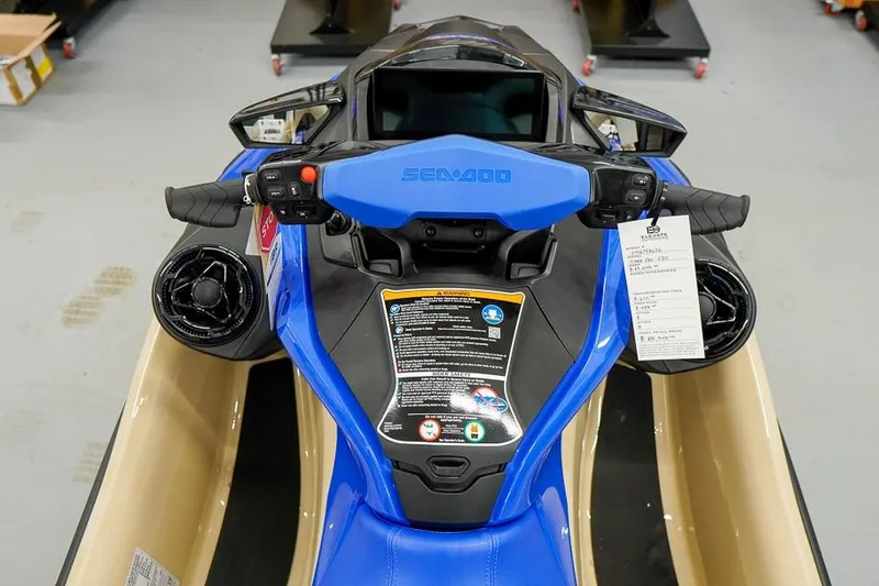 Slide: The Image of 2026 Sea-Doo Wake Pro 230 dashboard with controls and display in a showroom. - 15