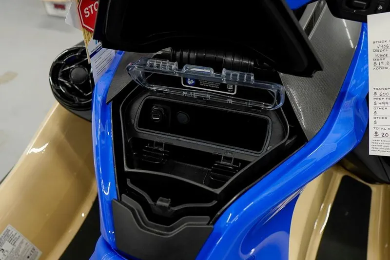 Slide: The Image of 2026 Sea-Doo Wake Pro 230 storage compartment, showcasing interior design and features. - 16