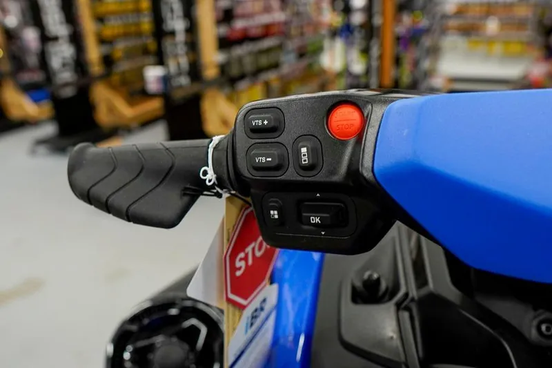 Slide: The Image of Close-up of 2026 Sea-Doo Wake Pro 230 handlebar controls in a showroom. - 17
