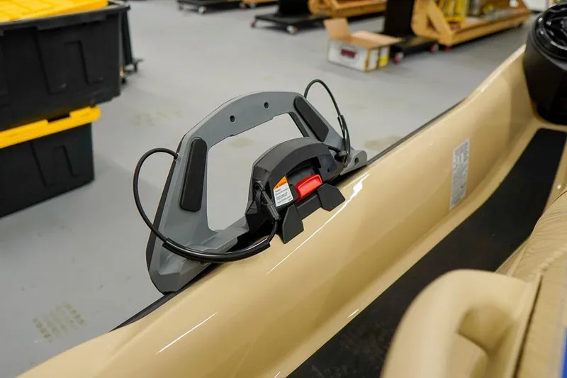 Slide: The Image of 2026 Sea-Doo Wake Pro 230 jet ski detail in a workshop setting. - 25