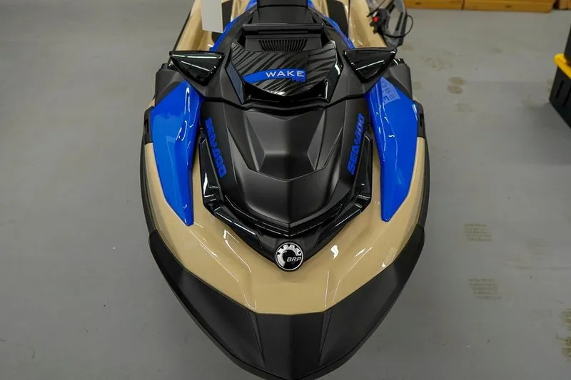 Slide: The Image of 2026 Sea-Doo Wake Pro 230 jet ski, blue and black design, top view. - 5