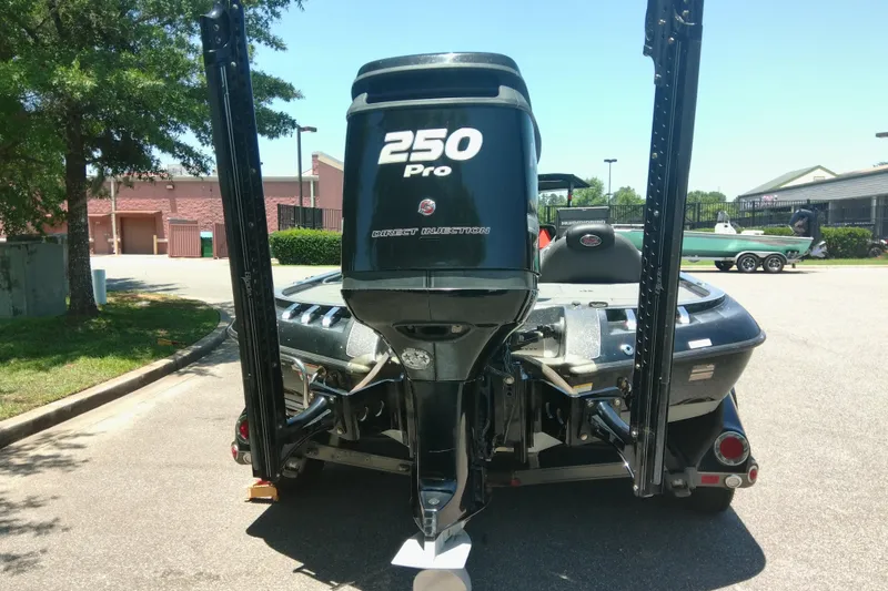 Slide: The Image of 2012 Ranger Z520 boat with 250 Pro engine, parked outdoors. - 5