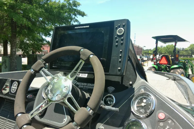 Slide: The Image of Steering console of 2012 Ranger Z520 boat with Humminbird electronics and sonar accessories. - 7