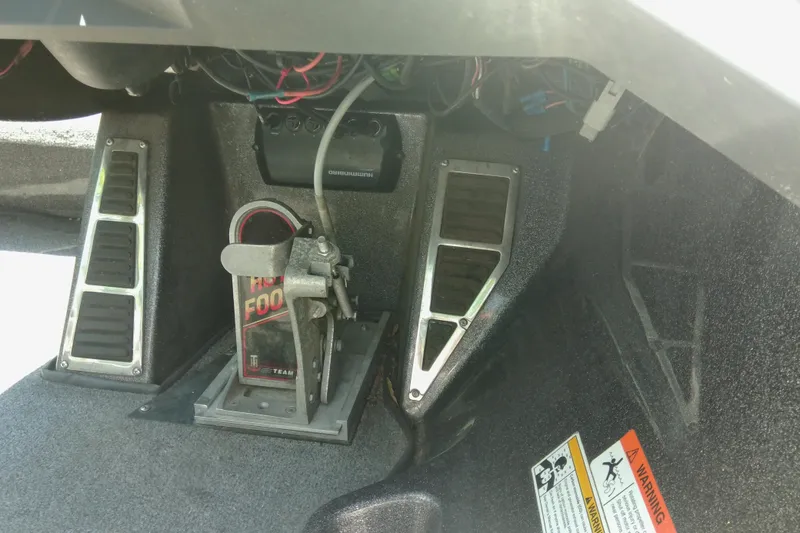 Slide: The Image of Foot pedal and wiring inside a 2012 Ranger Z520 boat. - 8