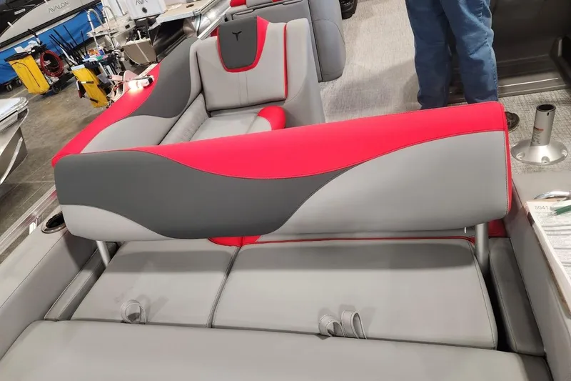 Slide: The Image of 2026 Tahoe Pontoon LTZ 2585 VRB interior with red and gray seating design. - 7