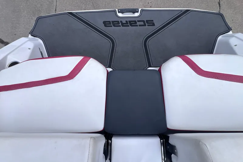 Slide: The Image of Rear seating and deck of 2014 Scarab 195 H.O. boat with red accents. - 8
