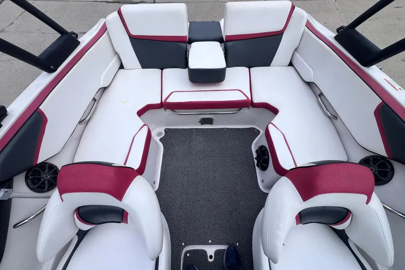 Slide: The Image of Interior of a 2014 Scarab 195 H.O. boat with white and red seating. - 9
