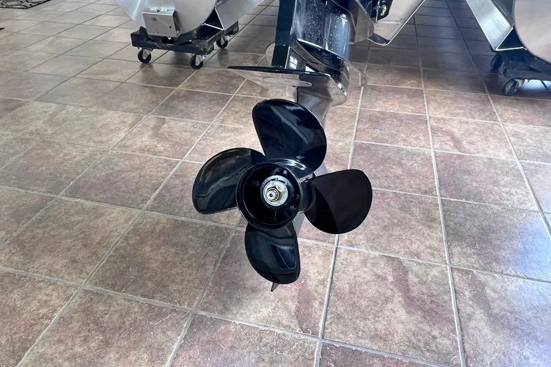 Slide: The Image of Propeller of 2026 Harris Cruiser 210 SLDH on tiled floor, showcasing sleek design. - 13