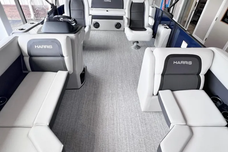 Slide: The Image of Interior of 2026 Harris Cruiser 210 SLDH pontoon boat with plush seating and modern design. - 15