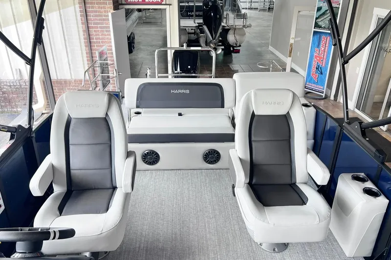 Slide: The Image of 2026 Harris Cruiser 210 SLDH interior with plush seating and modern design. - 5