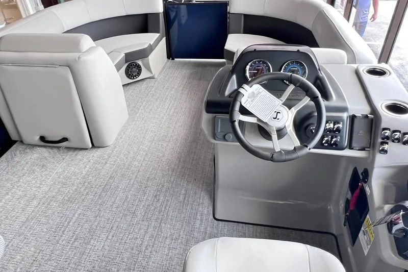 Slide: The Image of Interior of 2026 Harris Cruiser 210 SLDH pontoon boat with modern helm and seating. - 6