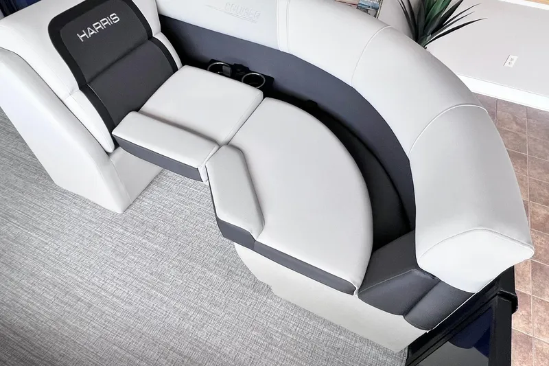 Slide: The Image of Luxurious seating on 2026 Harris Cruiser 210 SLDH pontoon boat, featuring sleek design and comfort. - 8
