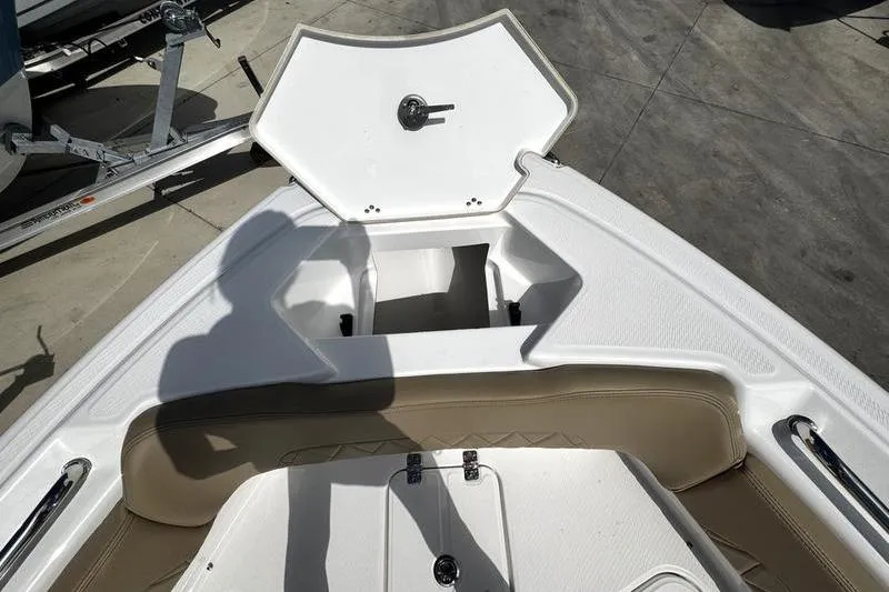 Slide: The Image of 2026 Blazer Bay Makaira 2800 boat interior with open storage compartment. - 14