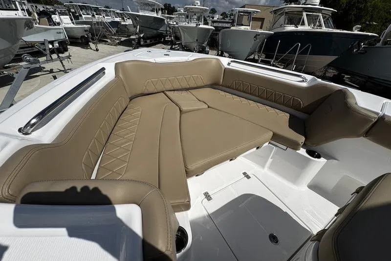 Slide: The Image of Luxurious seating area on 2026 Blazer Bay Makaira 2800 boat, featuring tan upholstery. - 22