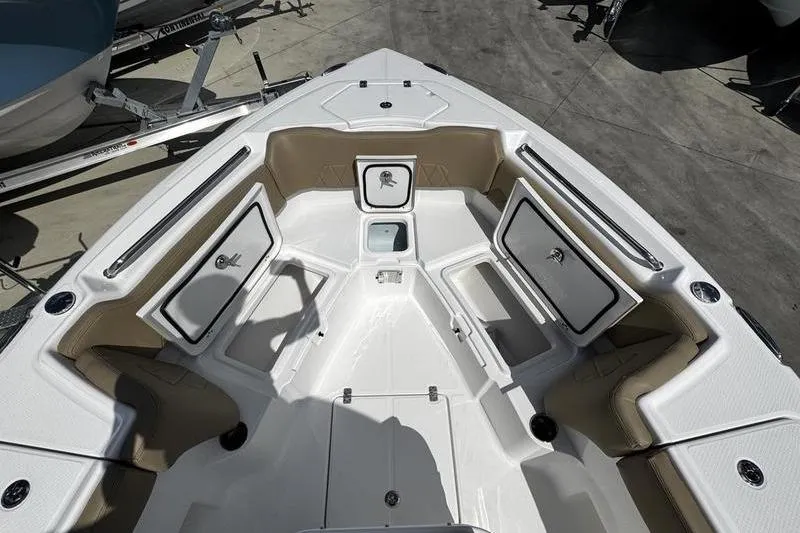 Slide: The Image of 2026 Blazer Bay Makaira 2800 boat interior with storage compartments and seating. - 6