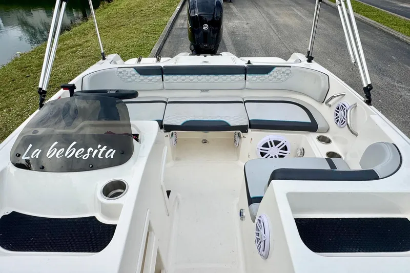 Slide: The Image of 2022 Bayliner Element M17 boat interior with seating and "La bebesita" on windshield. - 11