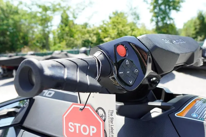 Slide: The Image of Close-up of 2026 Sea-Doo GTX 170 handlebar with control buttons and stop tag. - 18