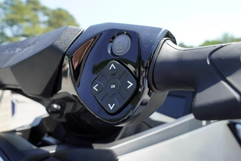 Slide: The Image of Close-up of 2026 Sea-Doo GTX 170 handlebar controls with directional buttons. - 20