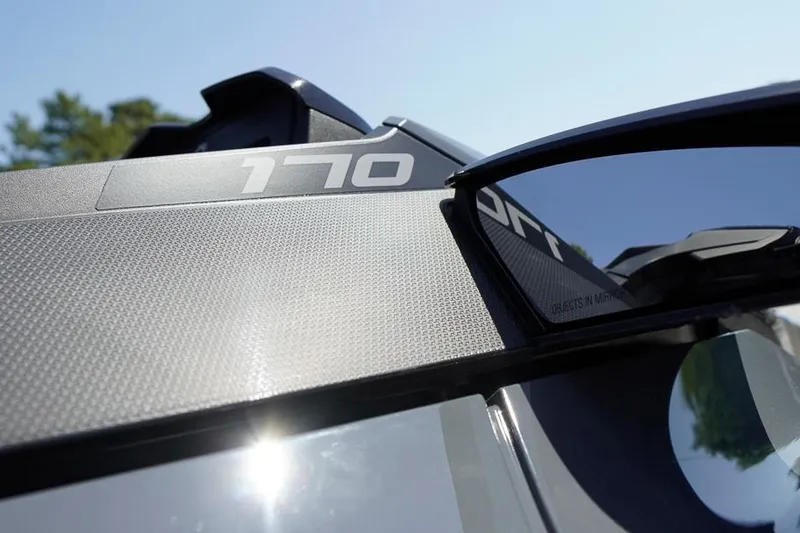 Slide: The Image of Close-up of 2026 Sea-Doo GTX 170 with textured surface and mirror detail. - 6