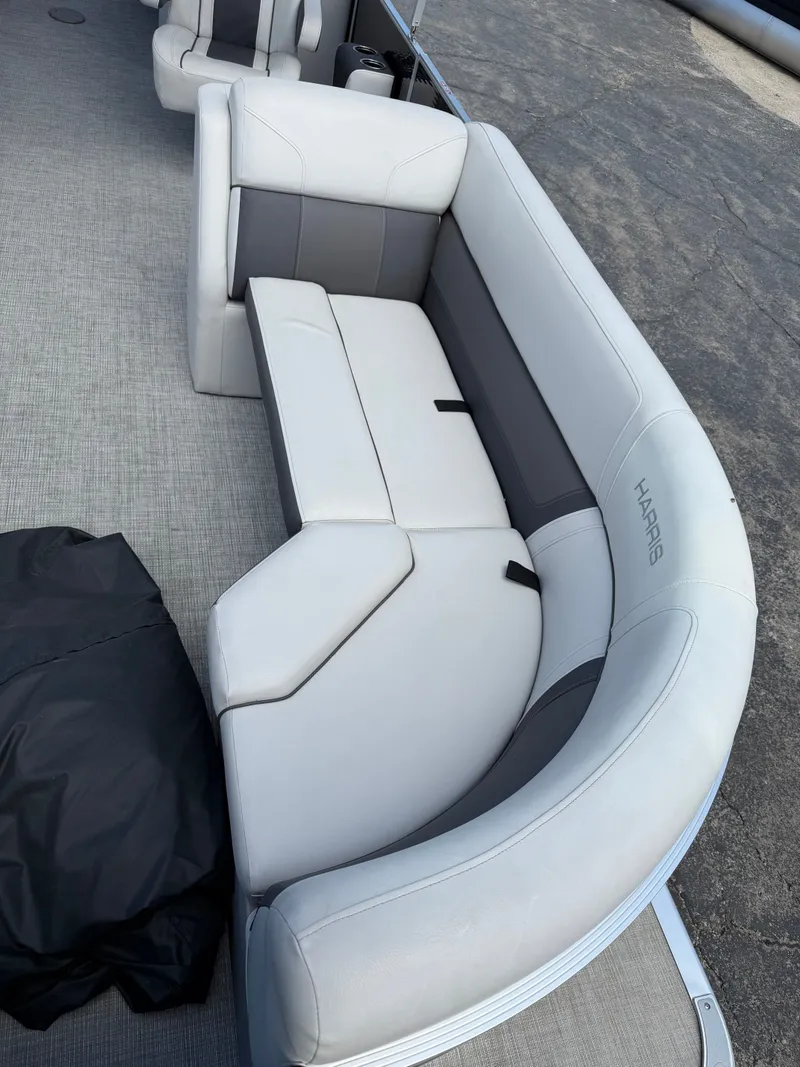 Slide: The Image of Interior of a 2021 Harris 230 Cruiser CWDH pontoon boat. - 2