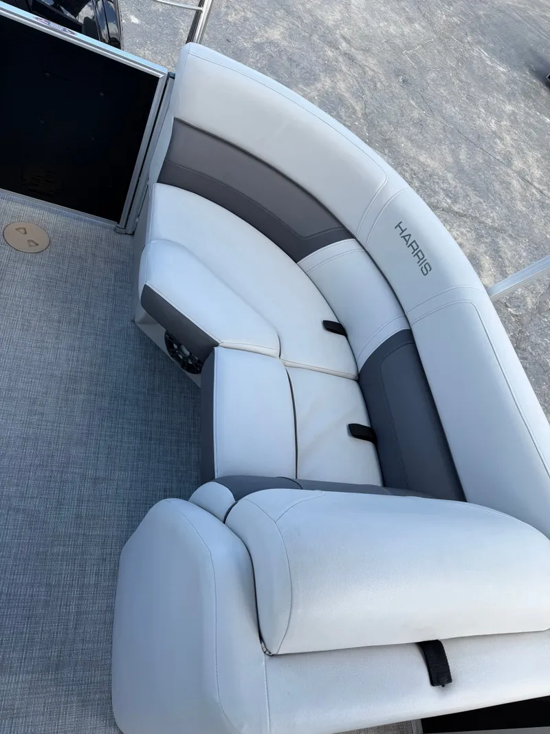 Slide: The Image of Harris 230 Cruiser CWDH 2021, white and gray boat seating. - 9